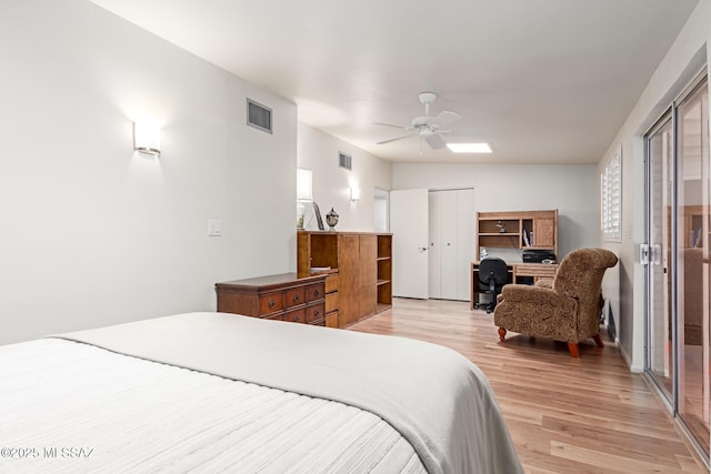 bedroom with ceiling fan and light hardwood / wood-style floors