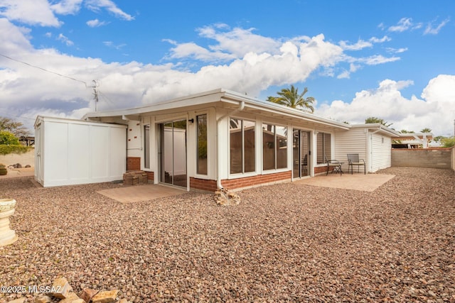 back of house featuring a patio