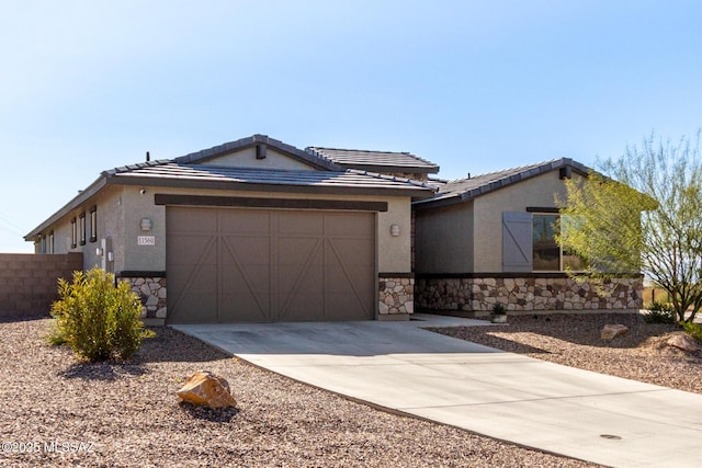 ranch-style house featuring a garage