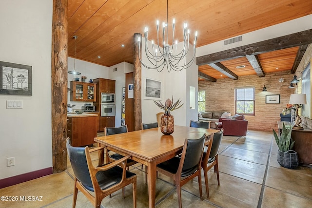 dining space with beam ceiling, wood ceiling, brick wall, and an inviting chandelier