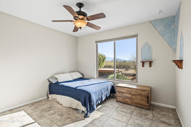 bedroom featuring ceiling fan