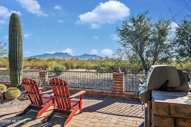 view of patio featuring a mountain view