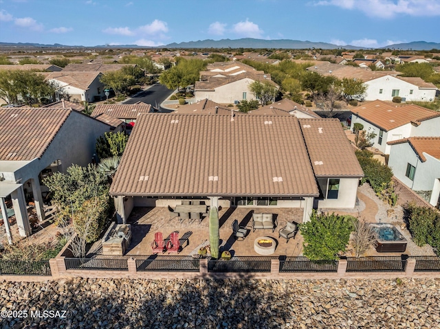 birds eye view of property featuring a mountain view