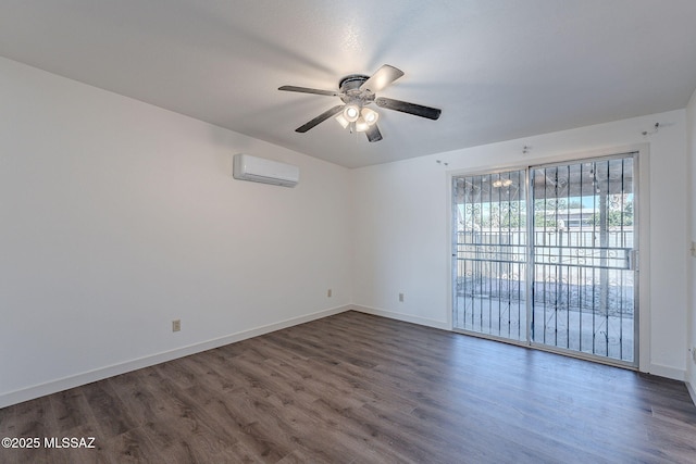 spare room with dark hardwood / wood-style floors, ceiling fan, and an AC wall unit