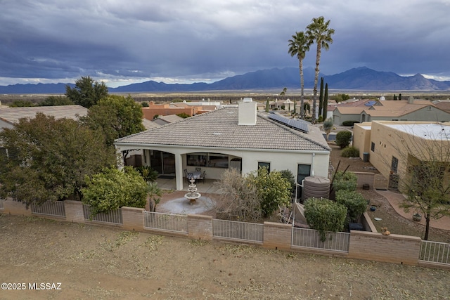 exterior space featuring a mountain view