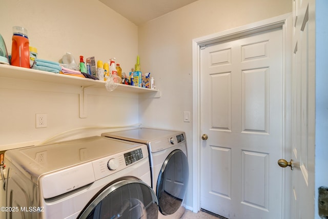 laundry room featuring washer and clothes dryer