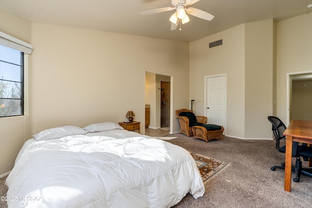 bedroom with ceiling fan and light colored carpet