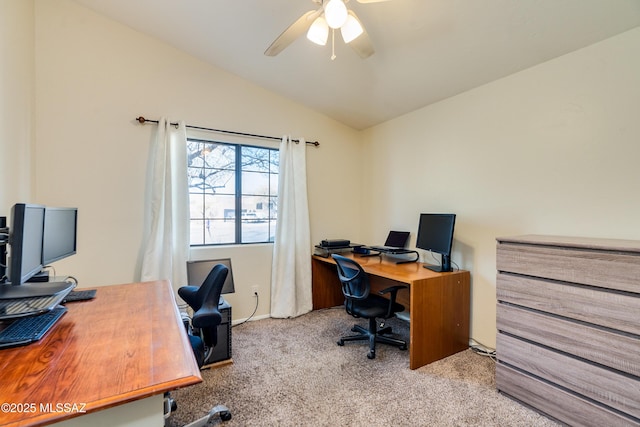 office with ceiling fan, lofted ceiling, and light carpet