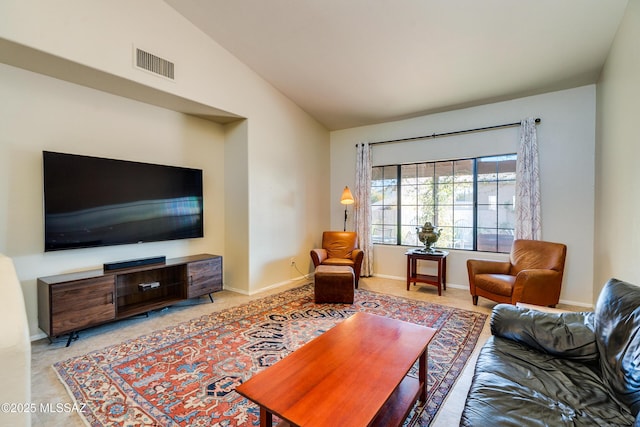 living room with vaulted ceiling