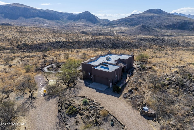 drone / aerial view featuring a mountain view