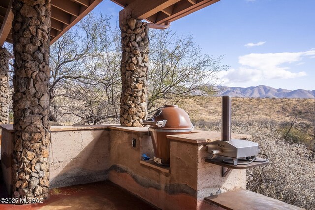 view of patio featuring a mountain view