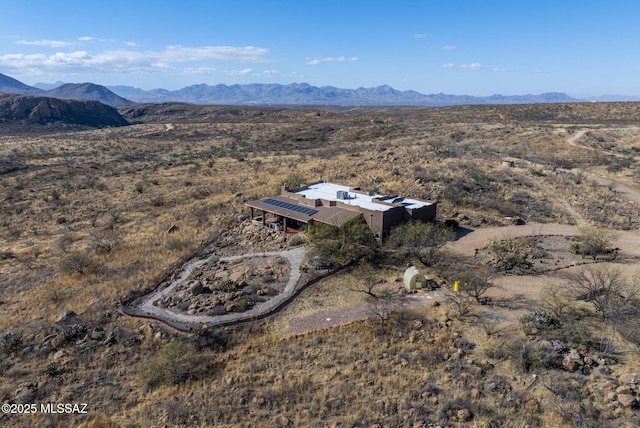 bird's eye view with a mountain view