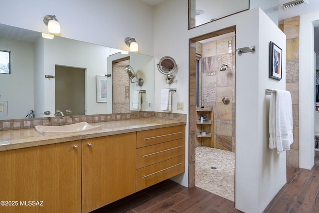 bathroom featuring vanity and walk in shower