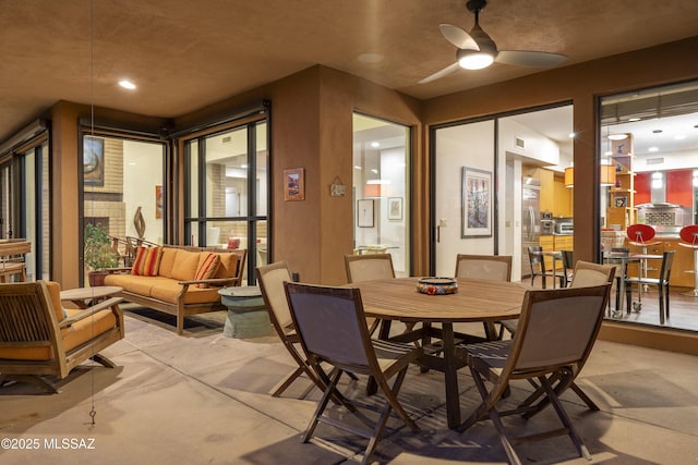 dining area with ceiling fan