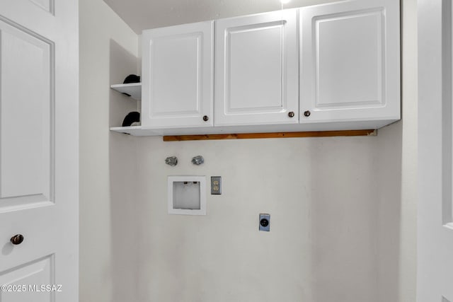 laundry room with washer hookup, electric dryer hookup, and cabinets