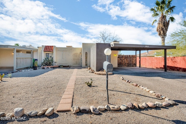 view of front of house featuring a carport