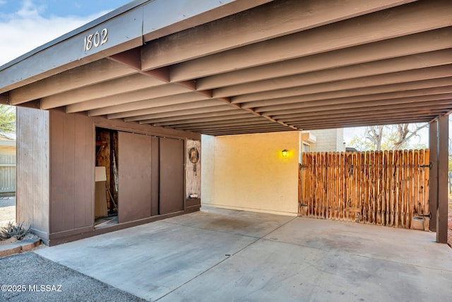 exterior space with a carport