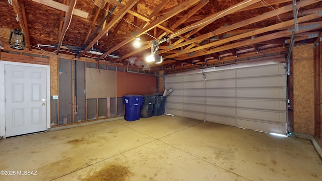 garage featuring a garage door opener