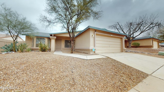 ranch-style home featuring a porch and a garage