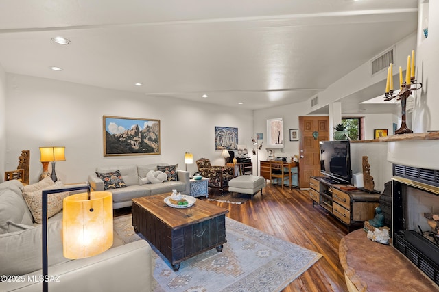 living room with dark hardwood / wood-style floors