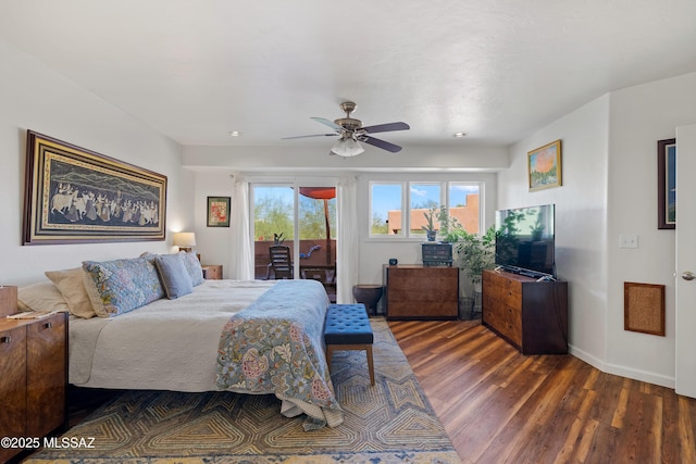 bedroom featuring dark hardwood / wood-style flooring, access to outside, and ceiling fan