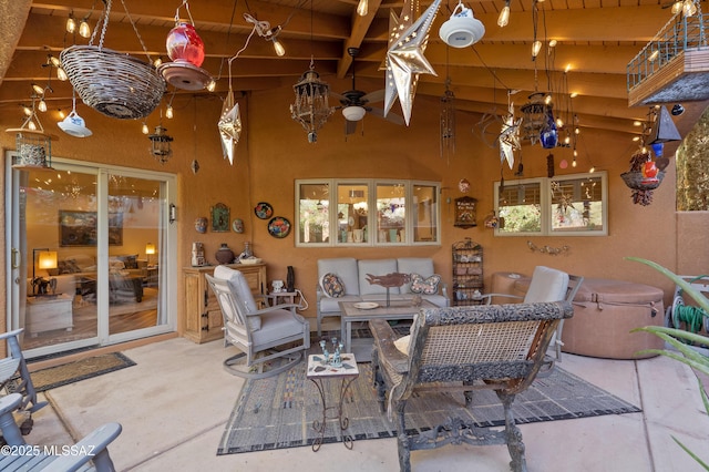 view of patio / terrace with an outdoor living space and ceiling fan