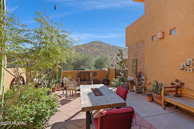 view of patio with a mountain view