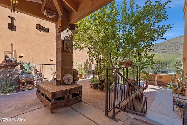 view of patio featuring a mountain view