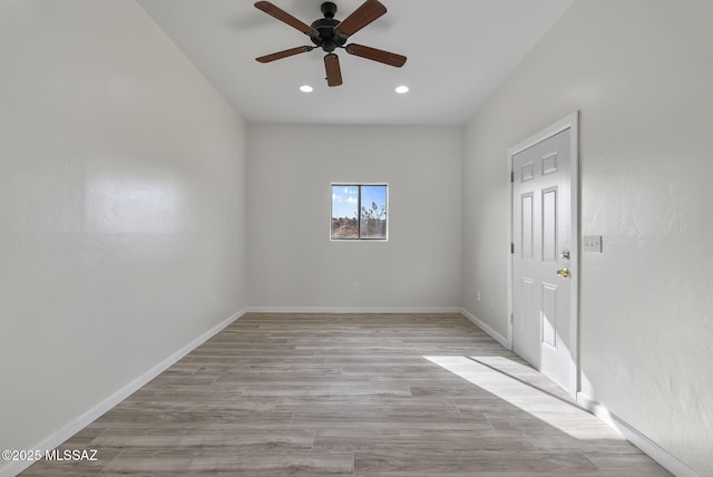 unfurnished room with recessed lighting, baseboards, light wood-type flooring, and ceiling fan