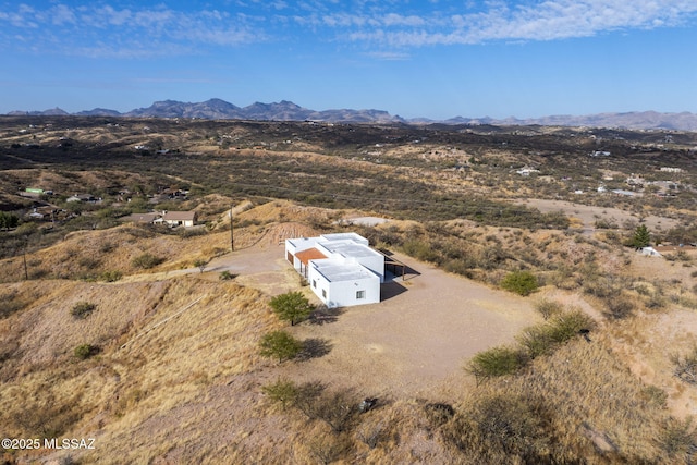 drone / aerial view featuring a mountain view