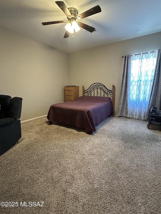 bedroom featuring carpet and a ceiling fan