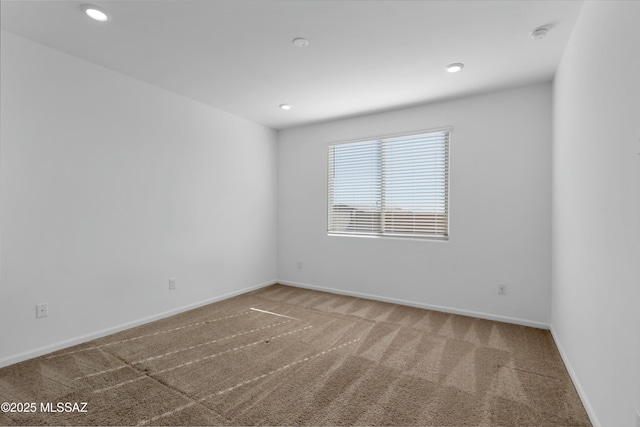 view of carpeted spare room