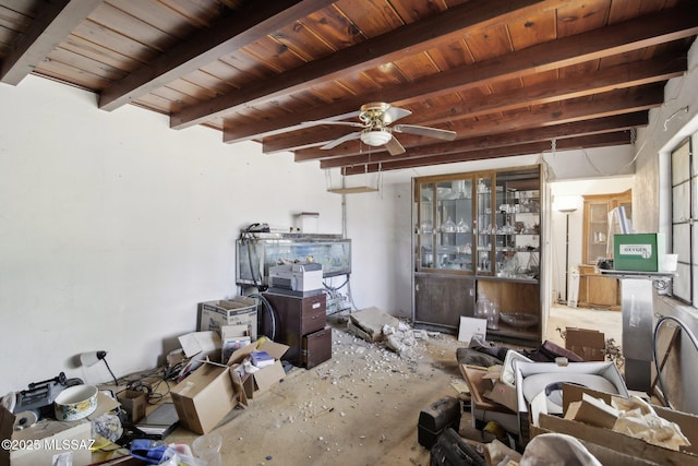 miscellaneous room with ceiling fan, wooden ceiling, and beamed ceiling