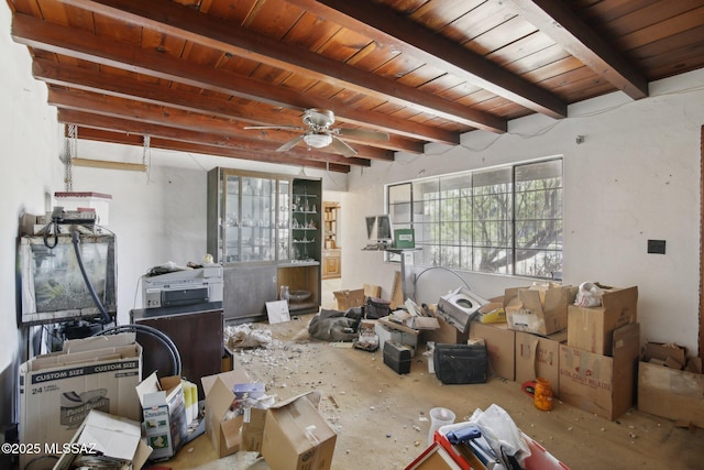 misc room featuring ceiling fan and beam ceiling