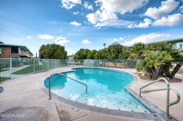 view of swimming pool featuring a patio