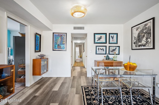 hallway featuring wood-type flooring