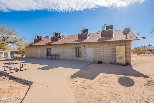 back of house featuring a patio area and central AC unit