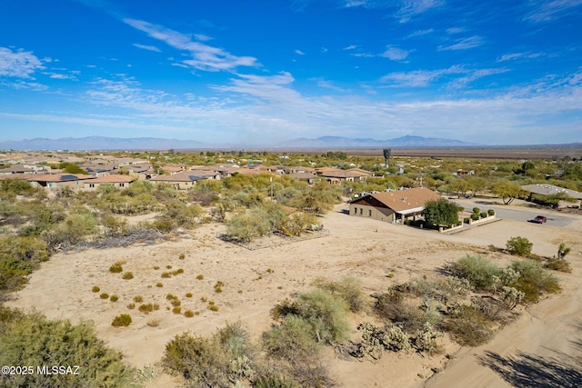 drone / aerial view featuring a mountain view