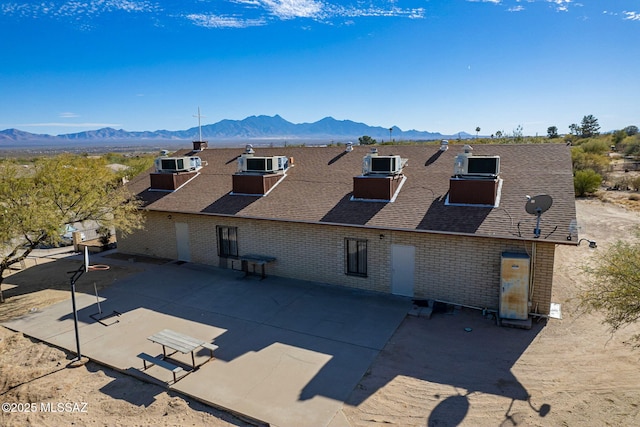 exterior space featuring a mountain view