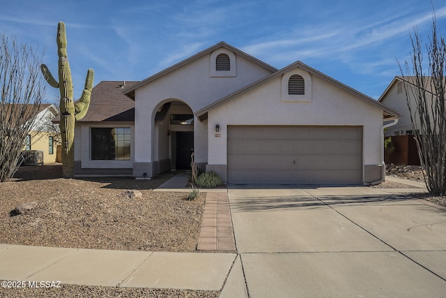 ranch-style home featuring a garage