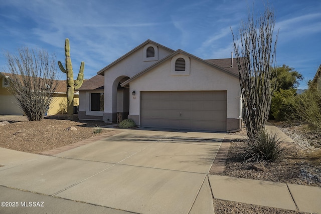 ranch-style house with a garage