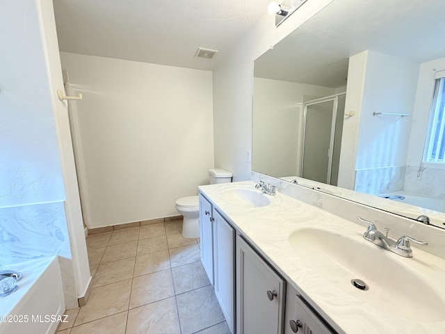 full bathroom featuring tile patterned flooring, vanity, independent shower and bath, and toilet