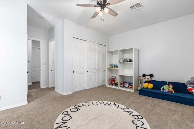 playroom featuring carpet flooring and ceiling fan