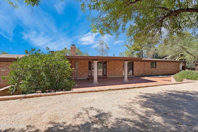 view of front of property with a patio