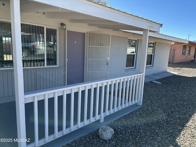 entrance to property with covered porch