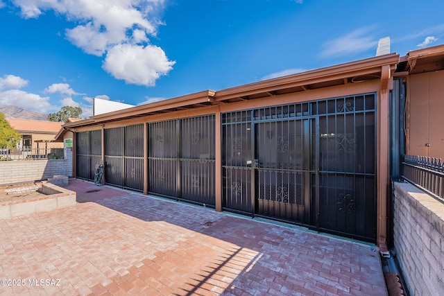 view of patio / terrace featuring a mountain view