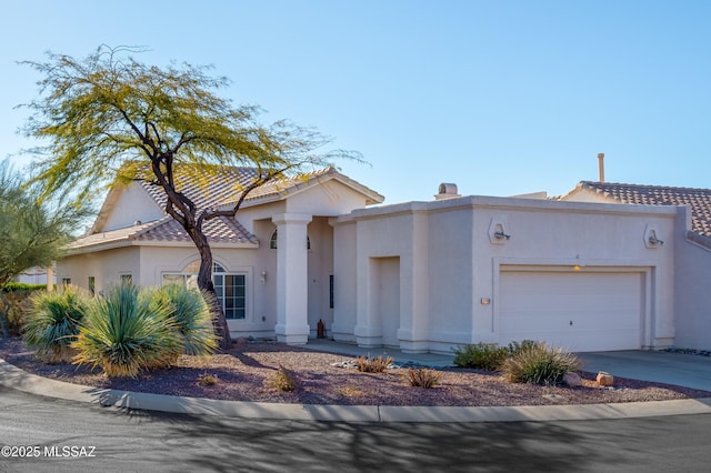 view of front of home with a garage