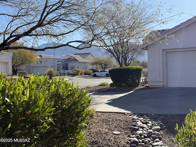 view of yard featuring a garage