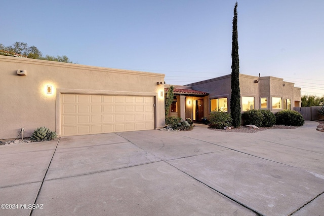 view of front of property featuring a garage