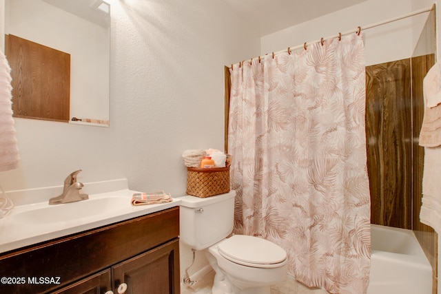 full bathroom with vanity, shower / bath combination with curtain, and toilet